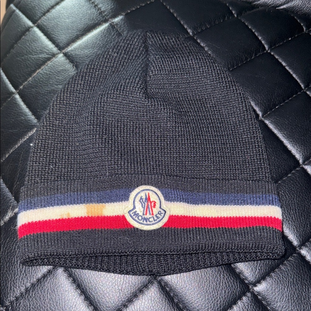 100% Authentic Moncler Kids Navy Beanie With Tricolor Stripe . It Is Stained !